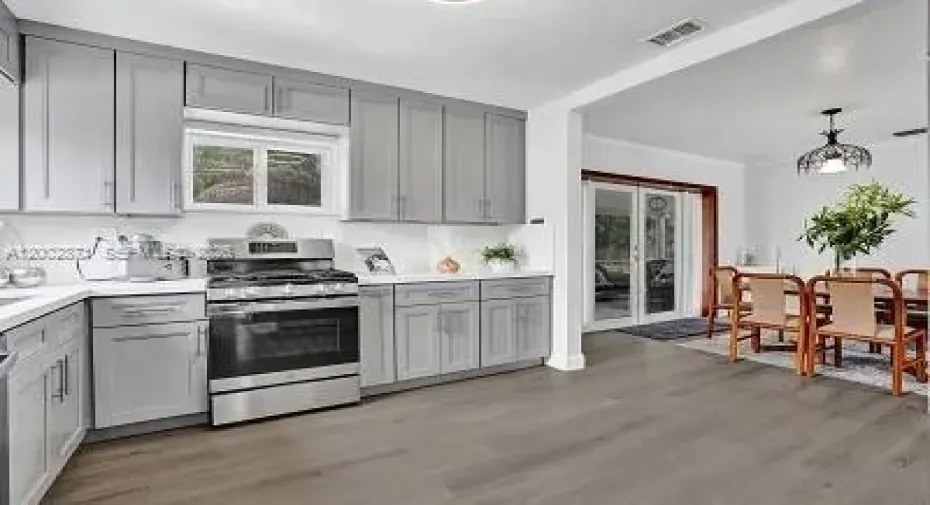 Updated kitchen featuring a gas stove