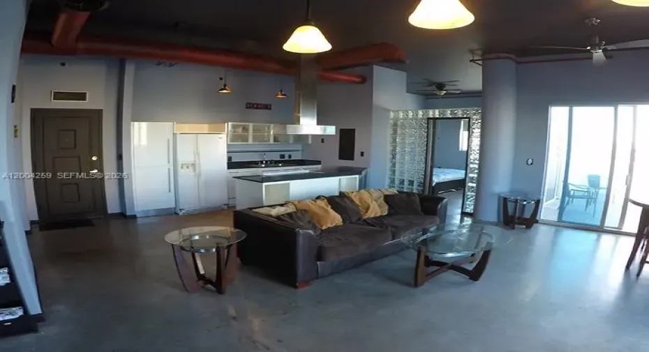 Living Room/ Kitchen with Semi Enclosed Master Bedroom