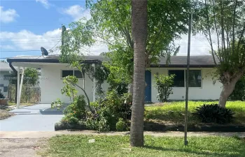 Freshly painted exterior.  One car carport.