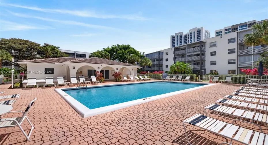 After a perfect day at the beach, cool off and relax by the community pool nestled in beautifully landscaped gardens.