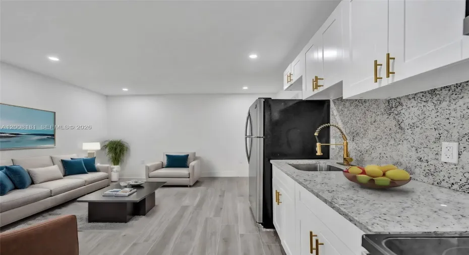 The unit is UNFURNISHED- This photo is VIRTUAL STAGED FOR VISUALIZATION