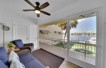 WOW, WOW, WOW! Picture THIS as Your Entrance! Step inside into the Your SCREENED-IN BALCONY & be Mesmerized by the ASTONISHINGLY BEAUTIFUL WATER VIEWS! A WATERFRONT SANCTUARY offers LIVING IN ELEGANCE, the PINNACLE OF WATERFRONT LIVING at its Finest! WELCOME HOME!