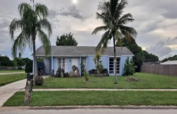 Location is Key! New flooring, kitchen cabinets, lighting, remodeled bathrooms, and landscape!