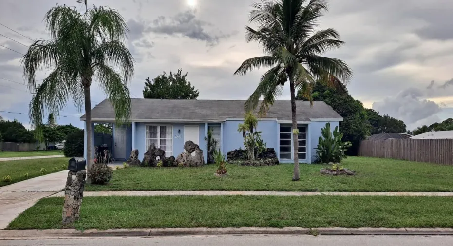 Location is Key! New flooring, kitchen cabinets, lighting, remodeled bathrooms, and landscape!