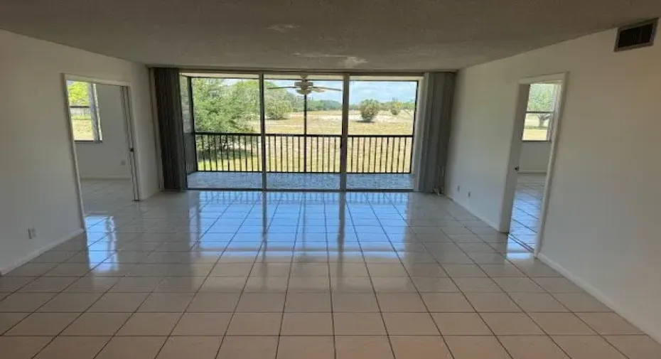 Large tiled living room & dining
