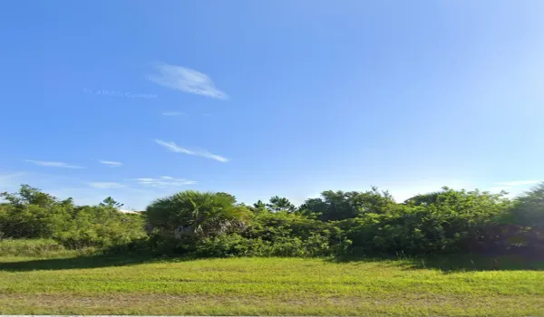 Prime Vacant Lot Near Community Entrance - Build Single or Multi-Family!