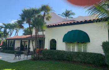 Intracoastal views, large lot, private gated, 4/3.5 with full primary suite first floor, cabana, heated pool, library, and garden more!