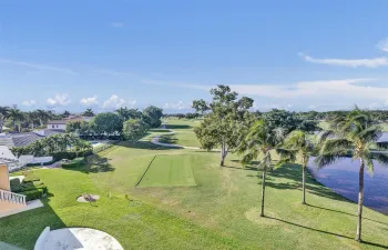 Living room view of the gorgeous golf course.