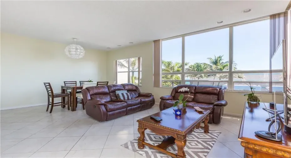 Spacious living/dining area with bayview windows