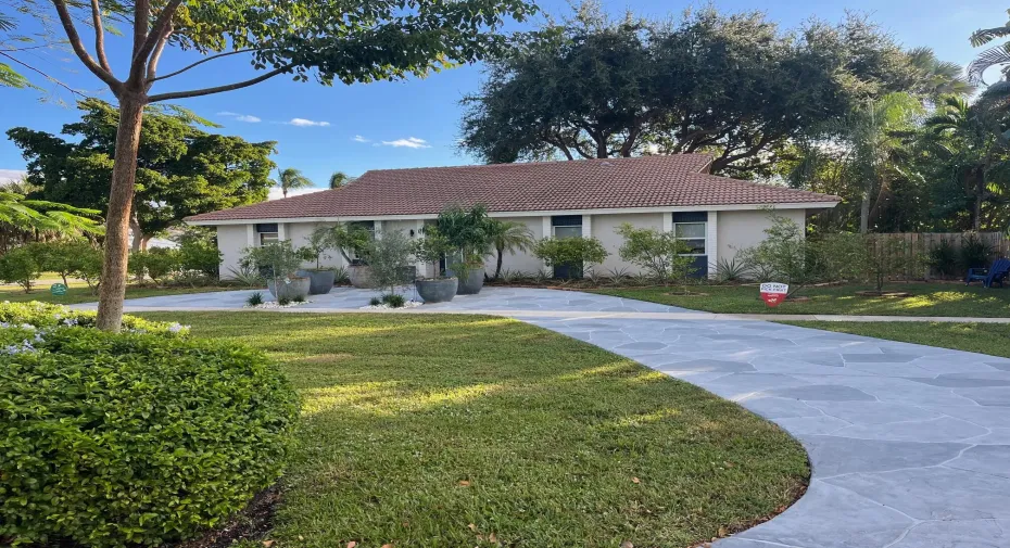 Decorated stamped concrete driveways circular and garage ent