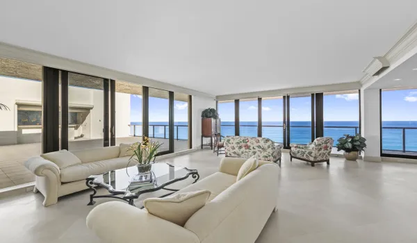 Expansive 29 x 25 living room with private expansive ocean views and balcony access