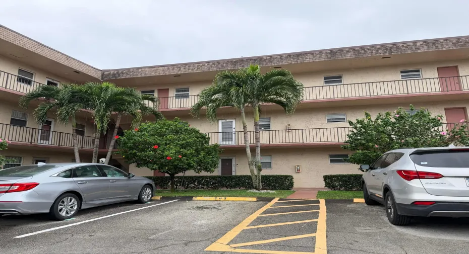 Condo on second floor of three story building
