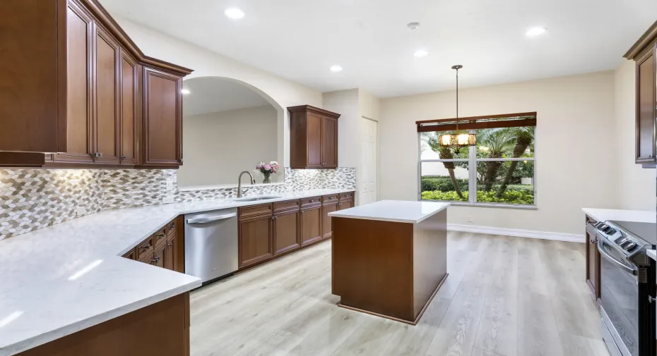 Kitchen was updated with new flooring, quartz countertops and s/s appliances
