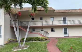 Front of building w/ steps leading to front door