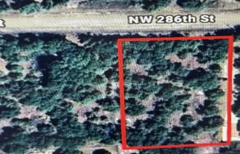 Adjacent lot also included. 3 acres total.