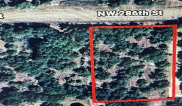 Adjacent lot also included. 3 acres total.