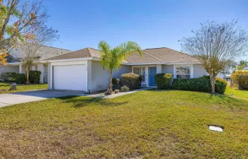 Stylish hip roof stucco ranch
