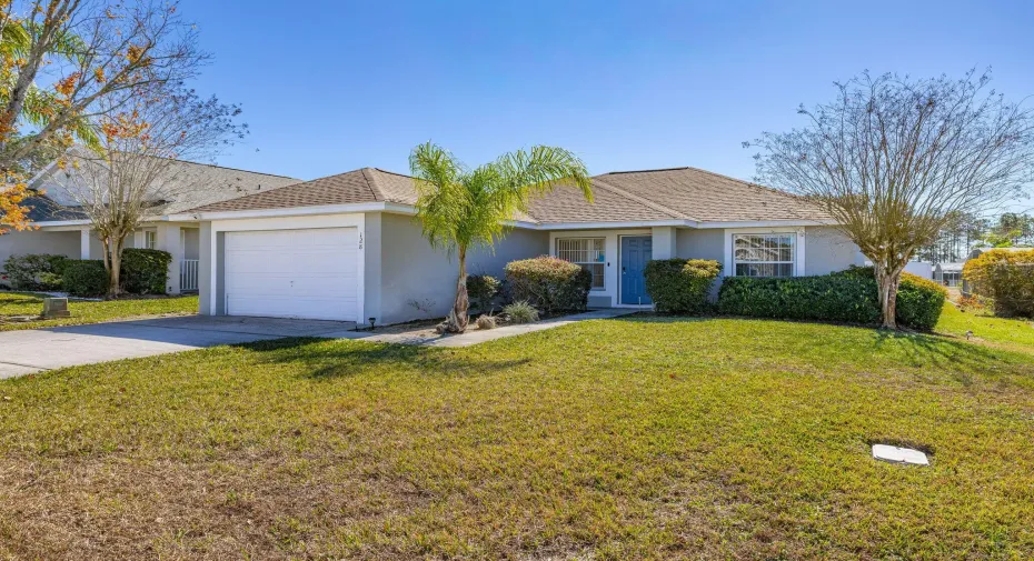 Stylish hip roof stucco ranch