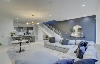Stairs lead to bedrooms