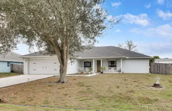 4074 SW Darwin Blvd - CBS built home!