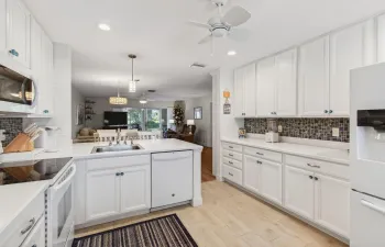 Open concept kitchen and mini desk area
