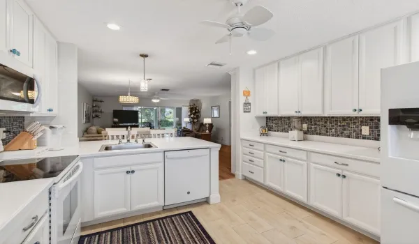 Open concept kitchen and mini desk area