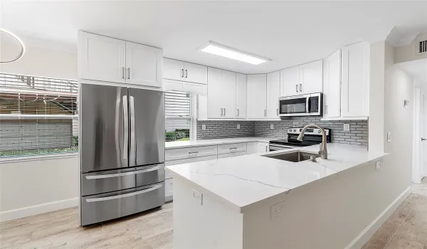 Welcome to this renovated, 1st Floor ANNUAL rental in Kings Point!
