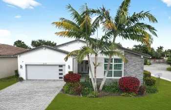 Meticulously-maintained single story home on a corner lot. 3 bedrooms, 2.1 baths, screened-in patio, fenced yard and 2,741 sqft. Built for energy efficiency and includes impact glass windows throughout.