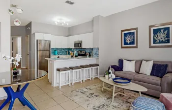 Open Family Room into the newly expanded kitchen and breakfast area
