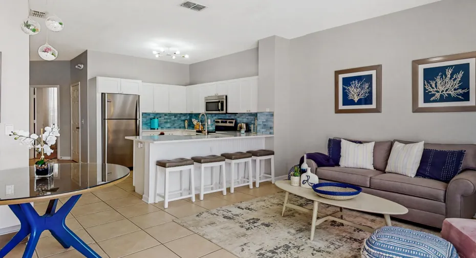 Open Family Room into the newly expanded kitchen and breakfast area