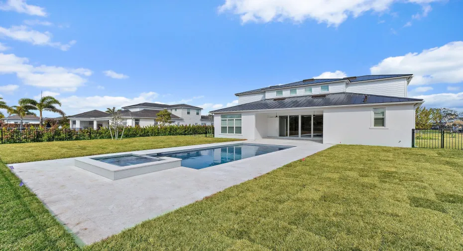 Back exterior with pool