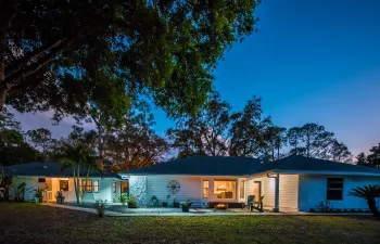 Welcome to your dream home in beautiful Jupiter Farms! In addition to the beautiful main home, there is a separate guest house which is ideal for extended family or a rental property.