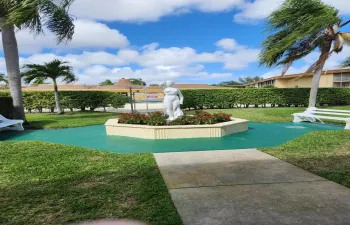 Garden Statue Entry to the Pool Area