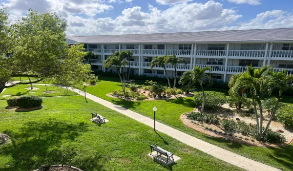 Lush gardens both in front and behind the residence.