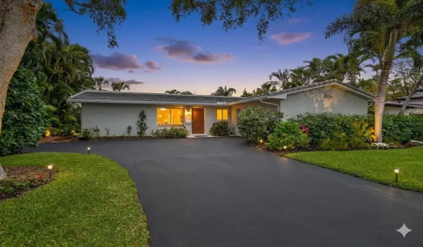 Long Driveway has extra parking space on west side