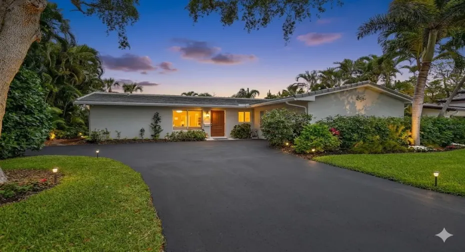 Long Driveway has extra parking space on west side
