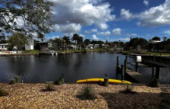VIEW OF PONTOON BOATS PASSING BY