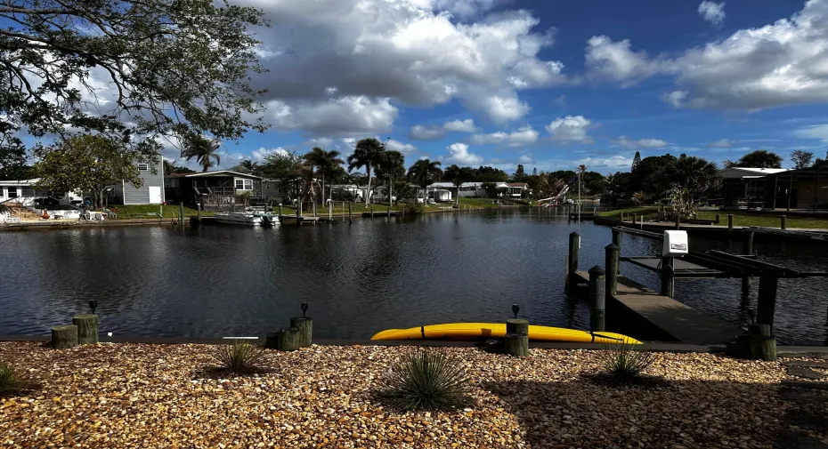 VIEW OF PONTOON BOATS PASSING BY