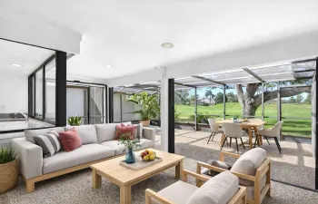 OVERSIZED covered patio for great entertaining space.