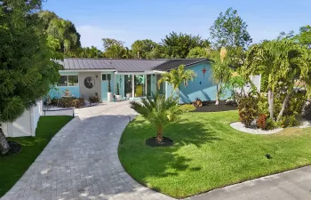 Front - large circular driveway with covered carport