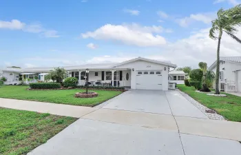 Lovely landscaping and double driveway,
