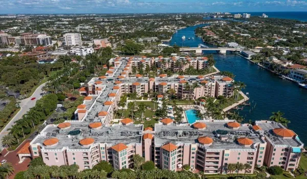 Mizner Court is South of Palmetto Park Road Bridge