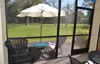 Spacious screened patio & outside patio with parklike view
