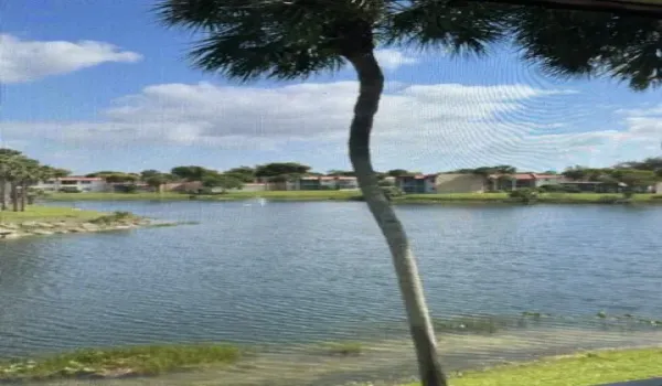 Long water view from screened in patio