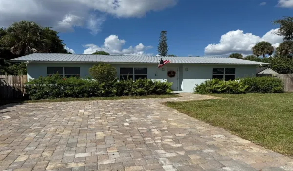 South East exposure with front elevation and 0 neighbors on adjoining south and western lots. We love the butterflies and hummingbirds that visit the butterfly plants in the front.