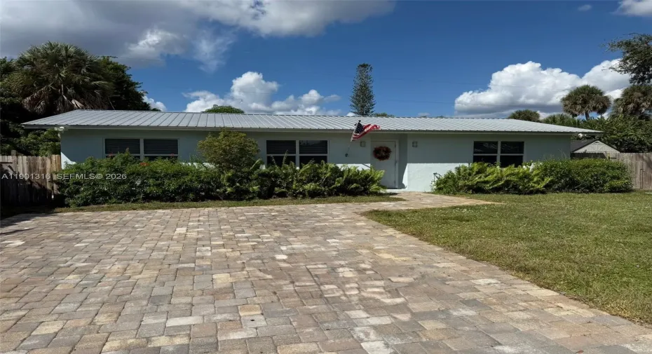 South East exposure with front elevation and 0 neighbors on adjoining south and western lots. We love the butterflies and hummingbirds that visit the butterfly plants in the front.