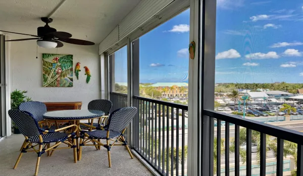 Large wrap balcony overlooking the marina and waterway