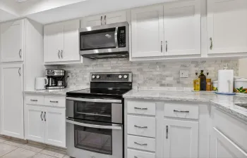 Remodeled kitchen, stainless & quartz