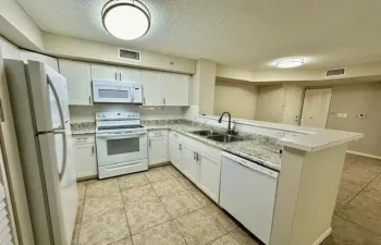 2 bedroom 2 bath first floor condo. located in a gated community & located across from Park vista high school and located in an 