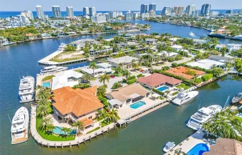 Aerial view of home facing southeast with the mouth of Middle River & Intracoastal in background
